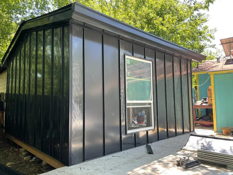 Black standing seam metal wall panels for Roof Inspection in Davie