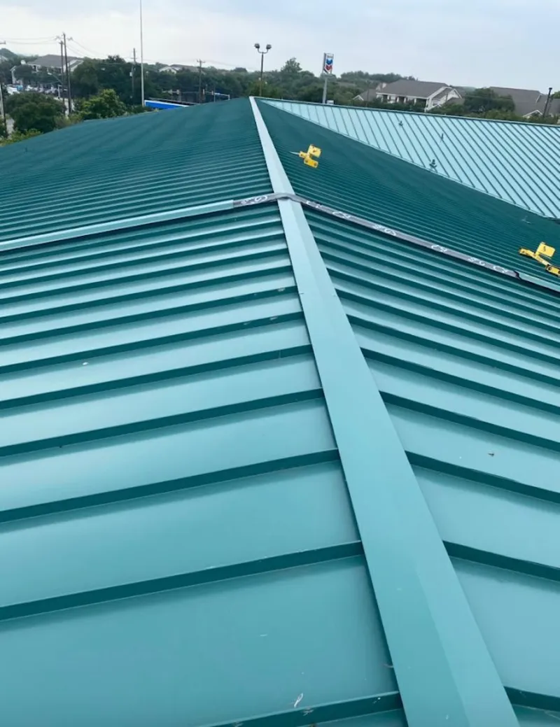 Green commercial metal roof ridge and valley for Metal Roof Repair in Davie